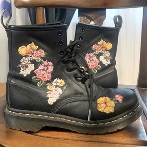 Dr. Martens black leather combat boots with floral embroidery